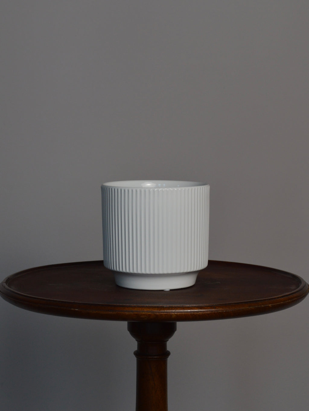 white glazed ceramic plant pot