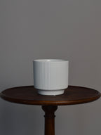 white glazed ceramic plant pot