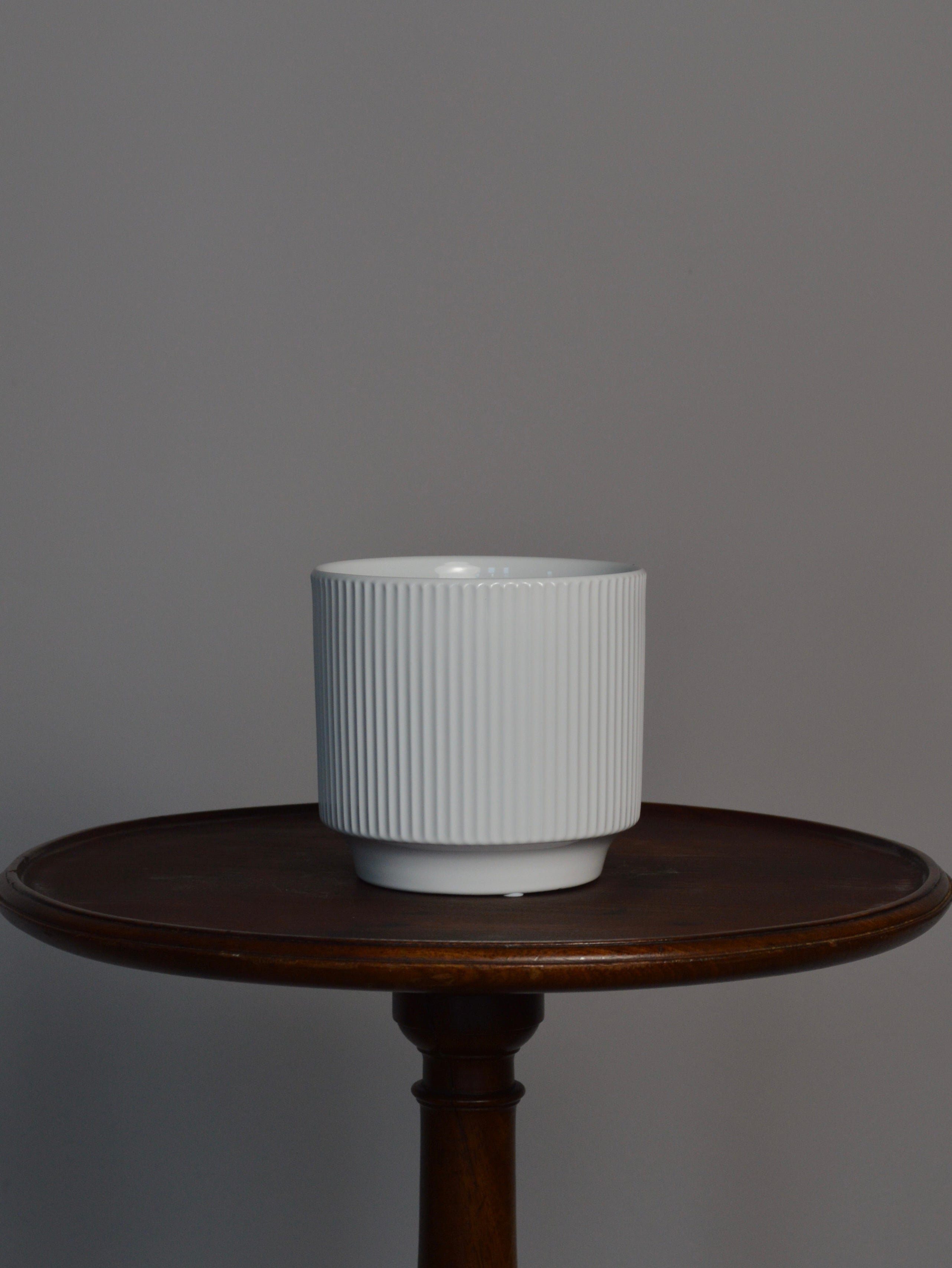 white glazed ceramic plant pot